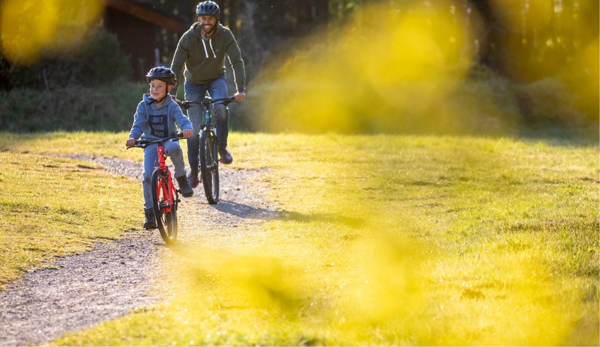 Ride a bike through the woods